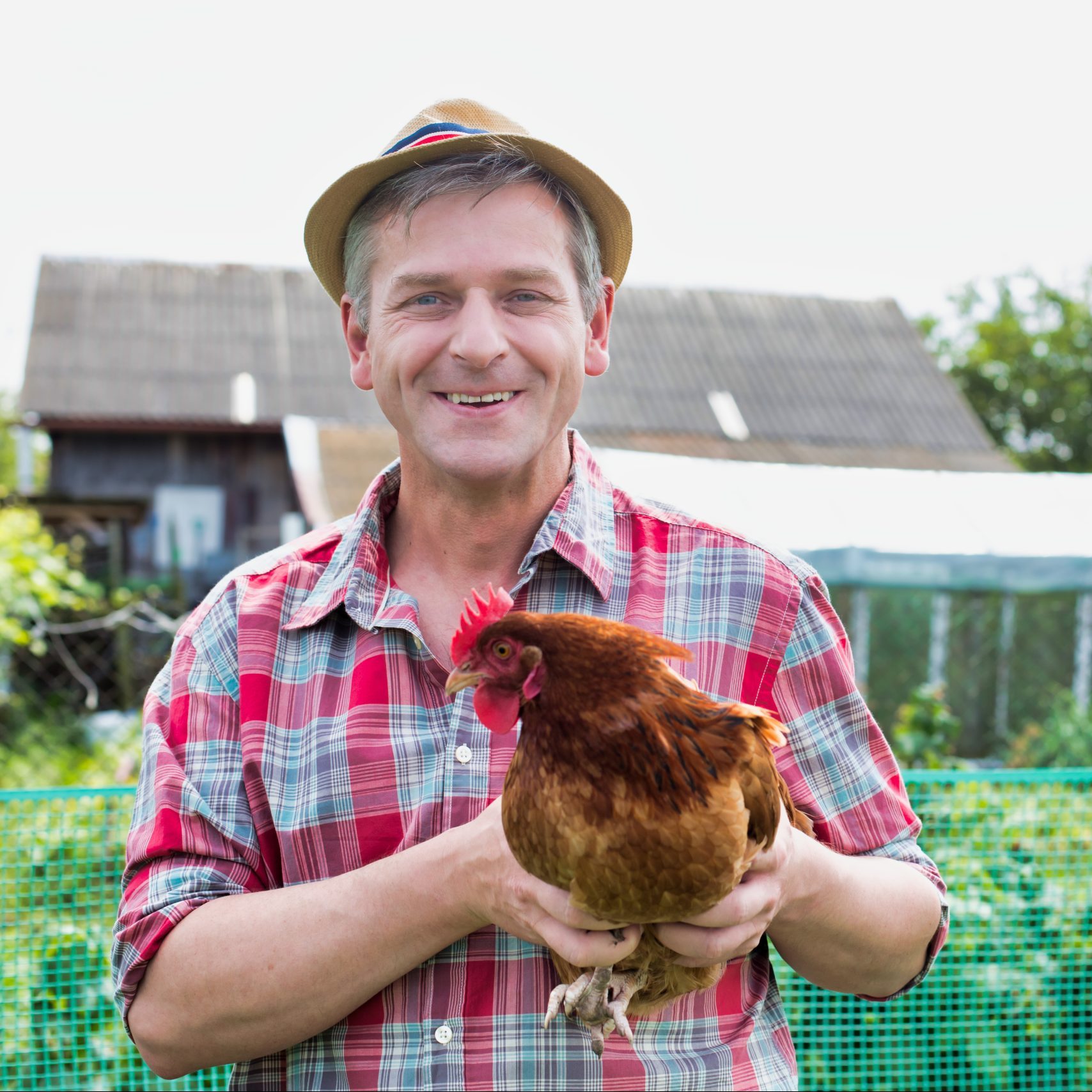 https://eggcartn.com/wp-content/uploads/happy-farmer-with-healthy-chicken-because-of-the-portable-easy-chicken-tractor-coop-on-wheels-for-laying-hens-1.jpeg